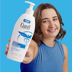 Curél Daily Healing Lotion in hand